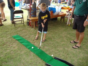 Kapaa High School Foundation booth featured a putting game with prizes