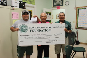 Principal Danny Hamada and Calvin Paleka accept Foundation check for Girls Volleyball